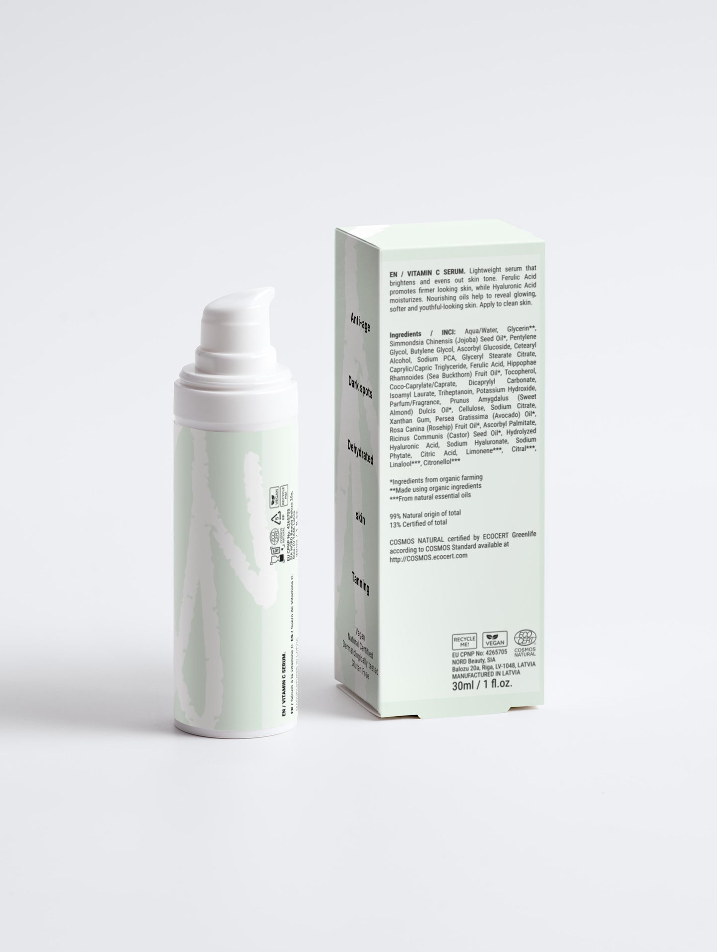 Skincare serum bottle and box on a white background